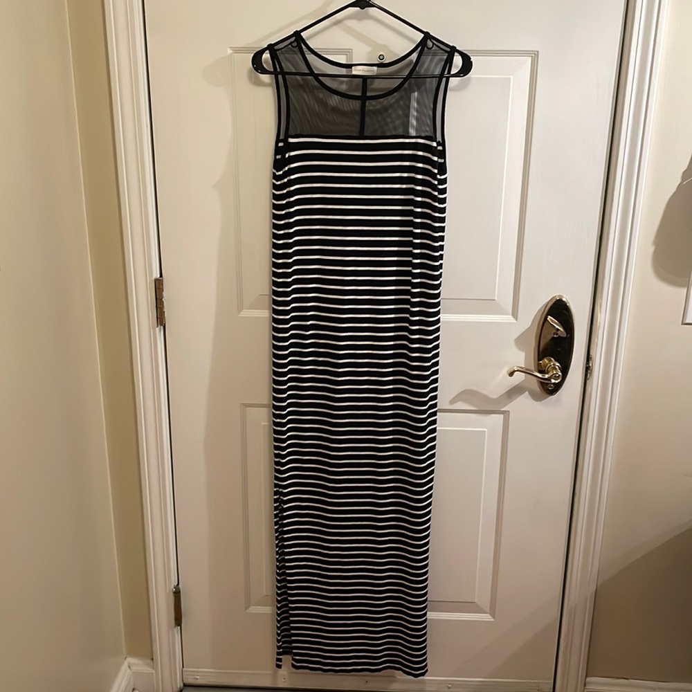 Sleeveless black/white stripe body con maxi dress with black sheer neckline